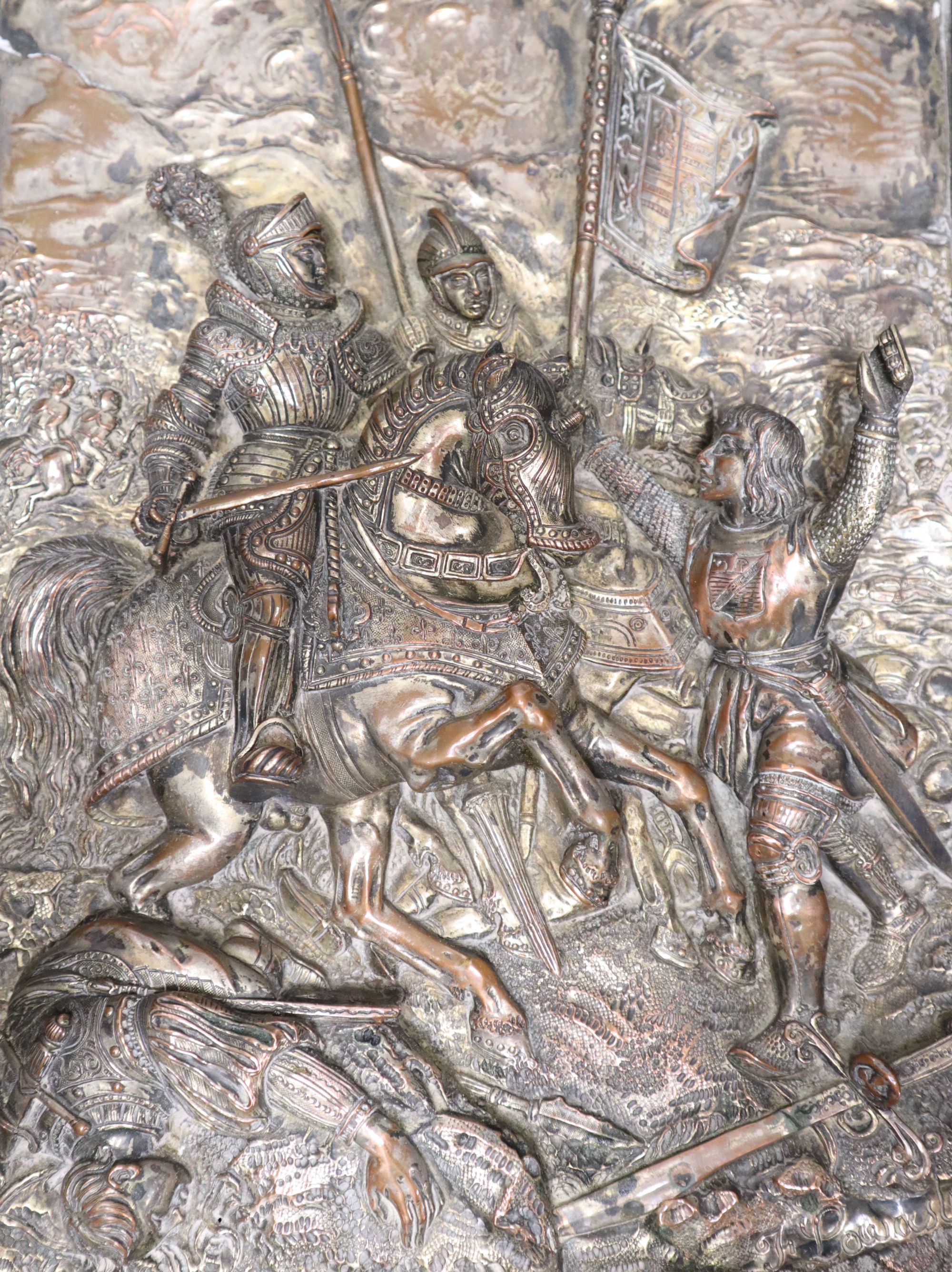 A 19th century French electrotype plaque, depicting a medieval battle scene, indistinctly signed, width 22cm height 29cm